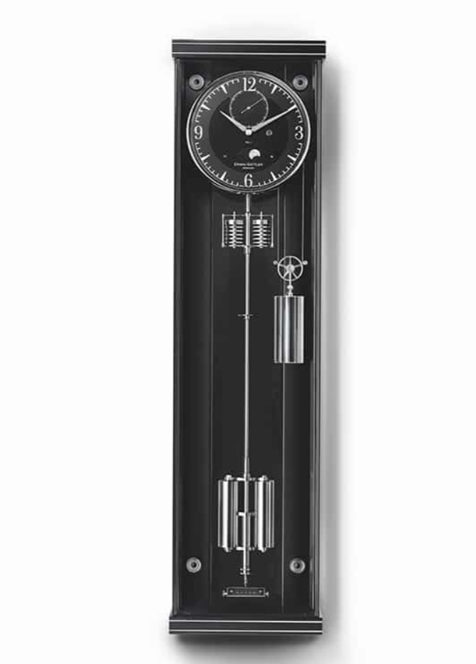 PR&Auml;ZISIONS-PENDELUHR ERWIN SATTLER OPUS METALLICA 100.
Zwart gelakte kast met hand gepolijste achterwand of hand gepolijste achterwand van echte Carbon. 105 cm hoog, 27 cm breed en 14 cm diep. U-Vormige ontspiegelde mineraal glazen deur. Precisie uurwerk Sattler Kaliber 2005-M. loopduur 28 dagen. Invar Compensatie slinger met luchtdruk compensatie middels Andro&iuml;de druk dozen. 8 Precisie kogellagers 6 Robijn lagers en 2 Agaat Ankerpaletten. Geanodiseerde wijzerplaat met handbeschilderde maanschijf. Hand gepolijste stalen wijzers.